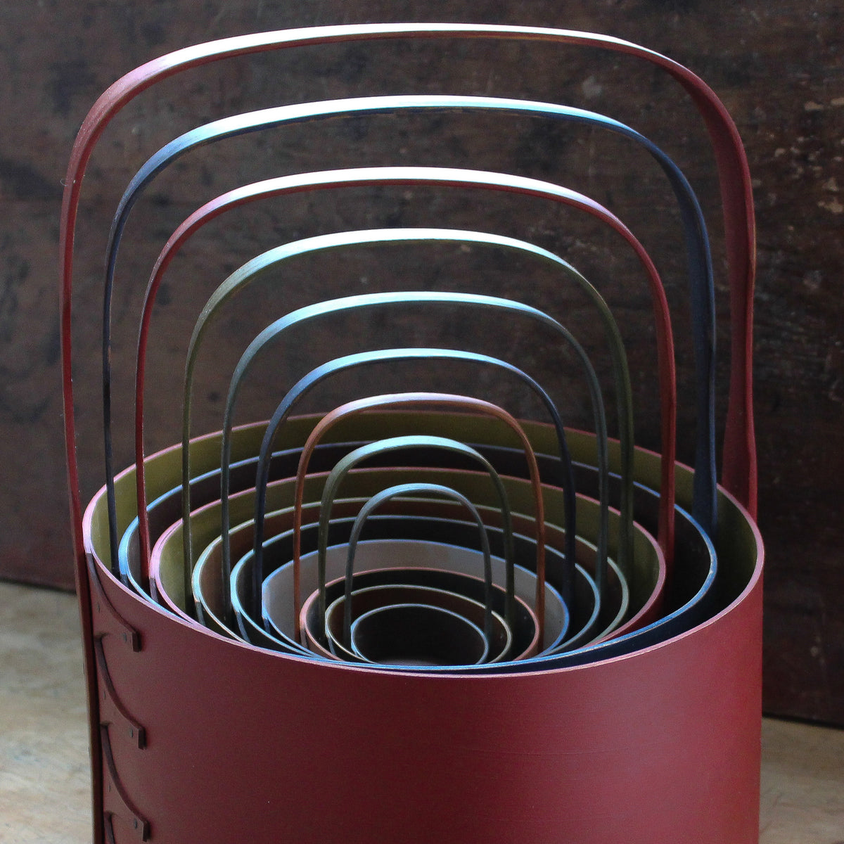 A nest of Shaker carriers in graduated sizes