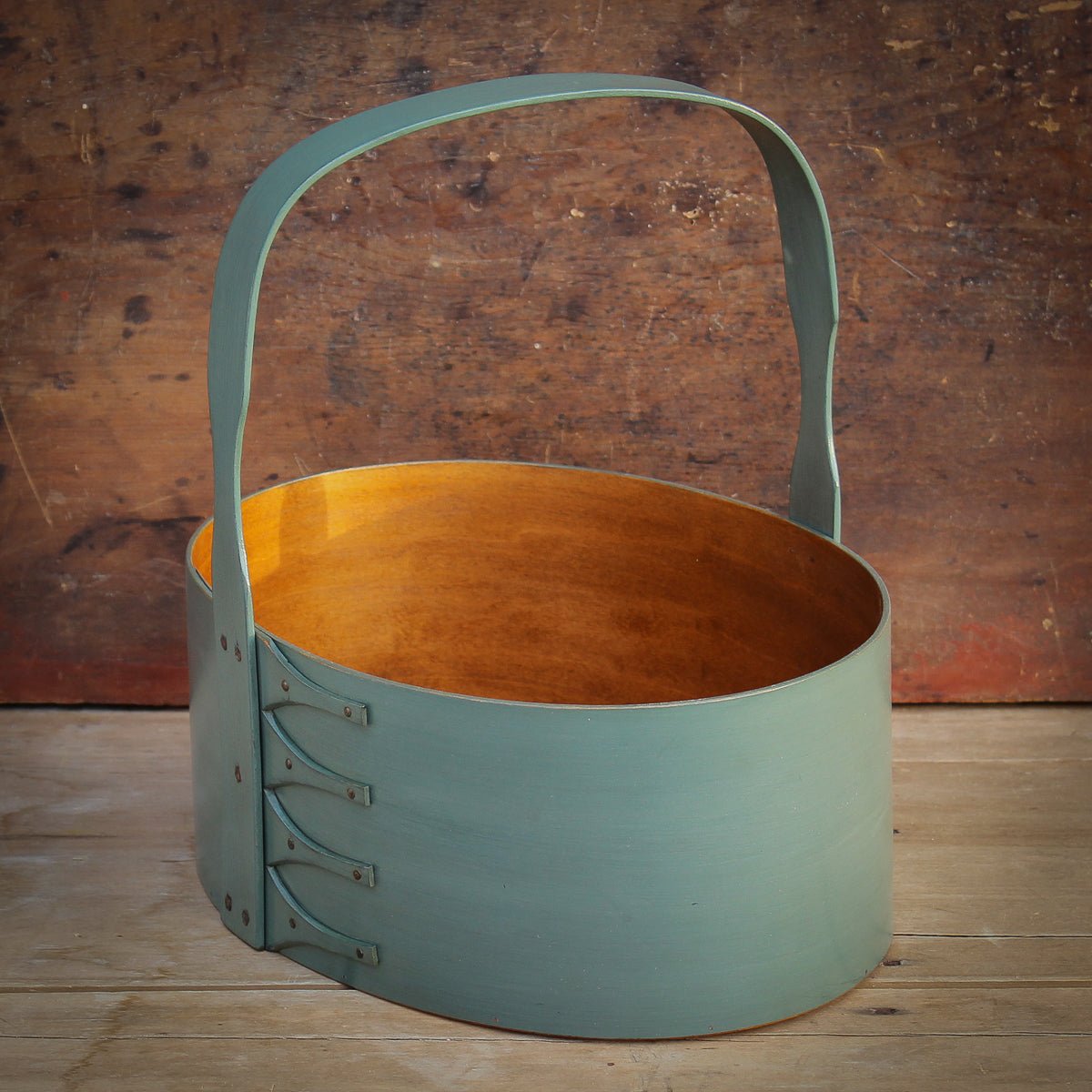 Shaker Carrier, handcrafted in Maine by LeHay’s Shaker Boxes. sea green milk paint finish.