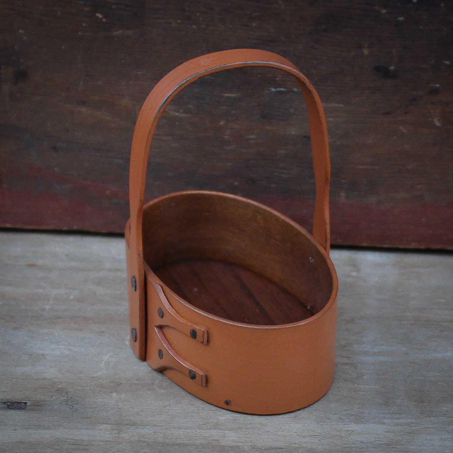 Shaker Carrier, Size #0, LeHays Shaker Boxes, Handcrafted in Maine.  Pumpkin Milk Paint Finish, Side View