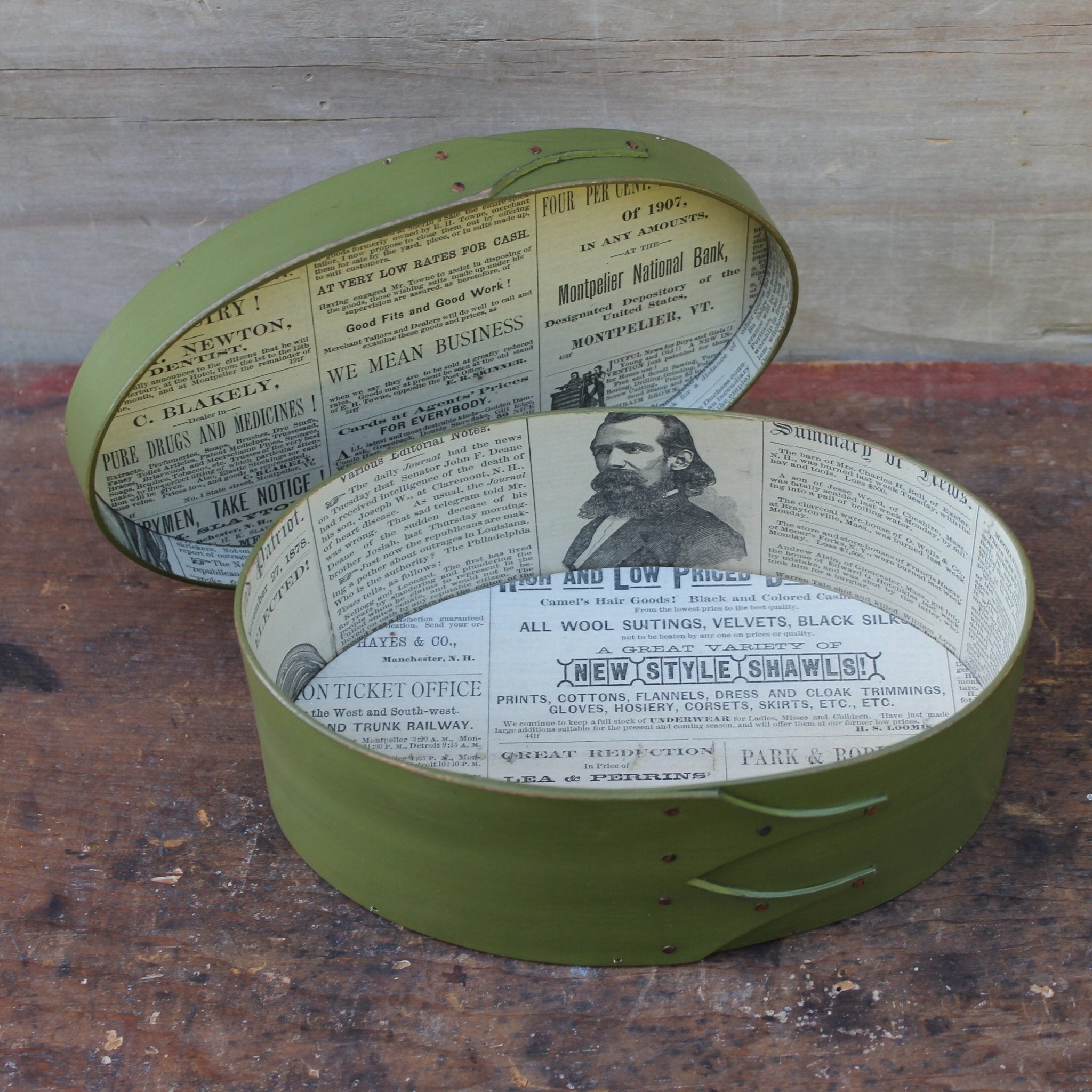 Shaker box with vintage 19th century newspaper lining, green milk paint finish.