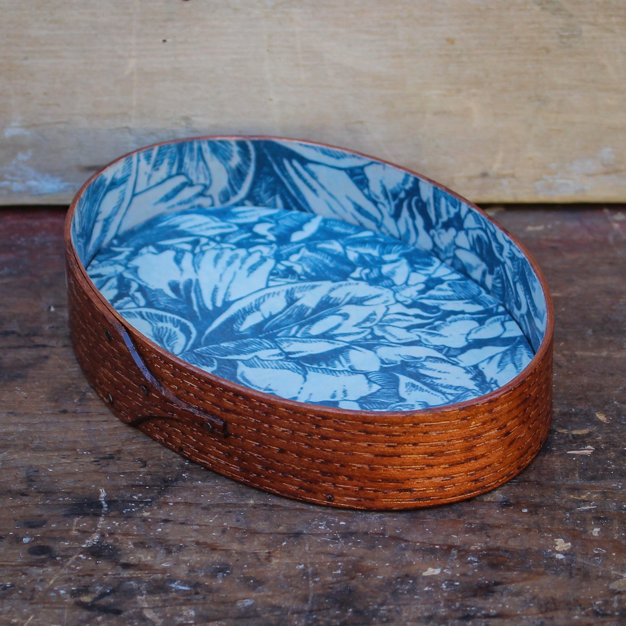 Shaker oval tray in antiqued natural finish and vintage paper lining - handcrafted by LeHay’s Shaker Boxes