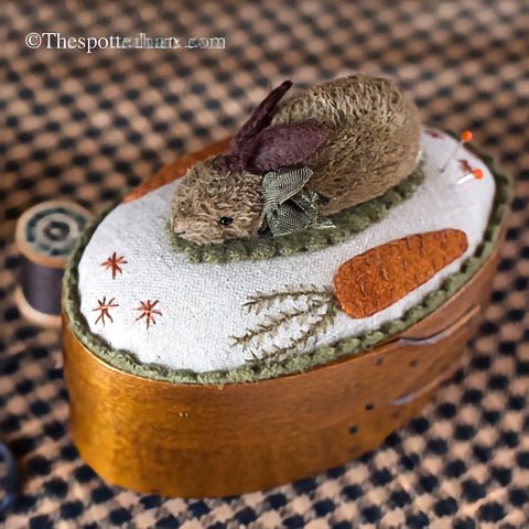 Handcrafted Shaker box featuring a decorative rabbit design, oval sewing box made in Maine, perfect for storage.