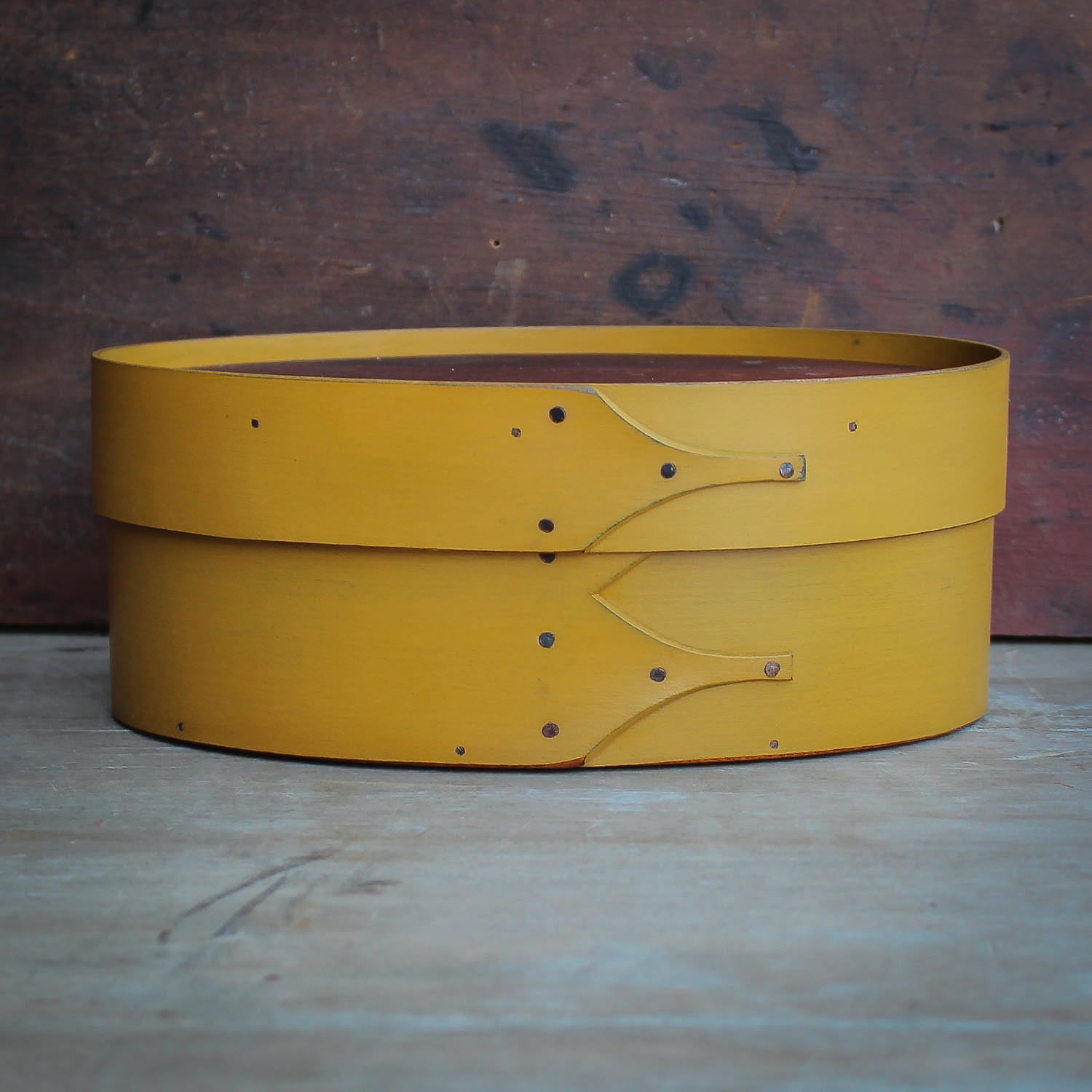 Shaker Oval Box, Size #3, with yellow finish and recessed lid for displaying finished needlework – handcrafted by LeHay’s Shaker Boxes