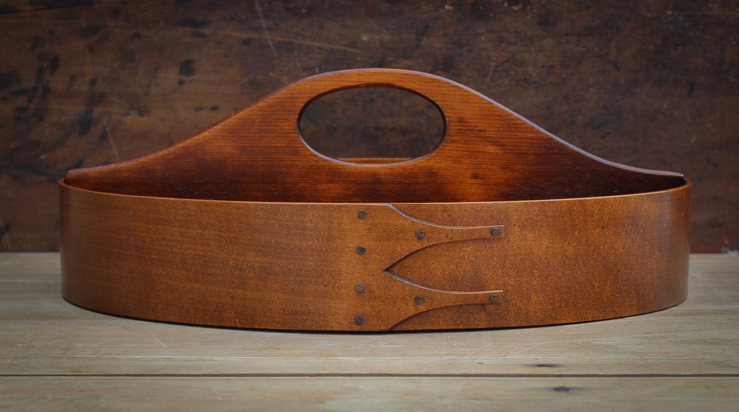 Handcrafted Shaker box in oval shape, suitable for sewing, made in Maine, showcasing a classic design.