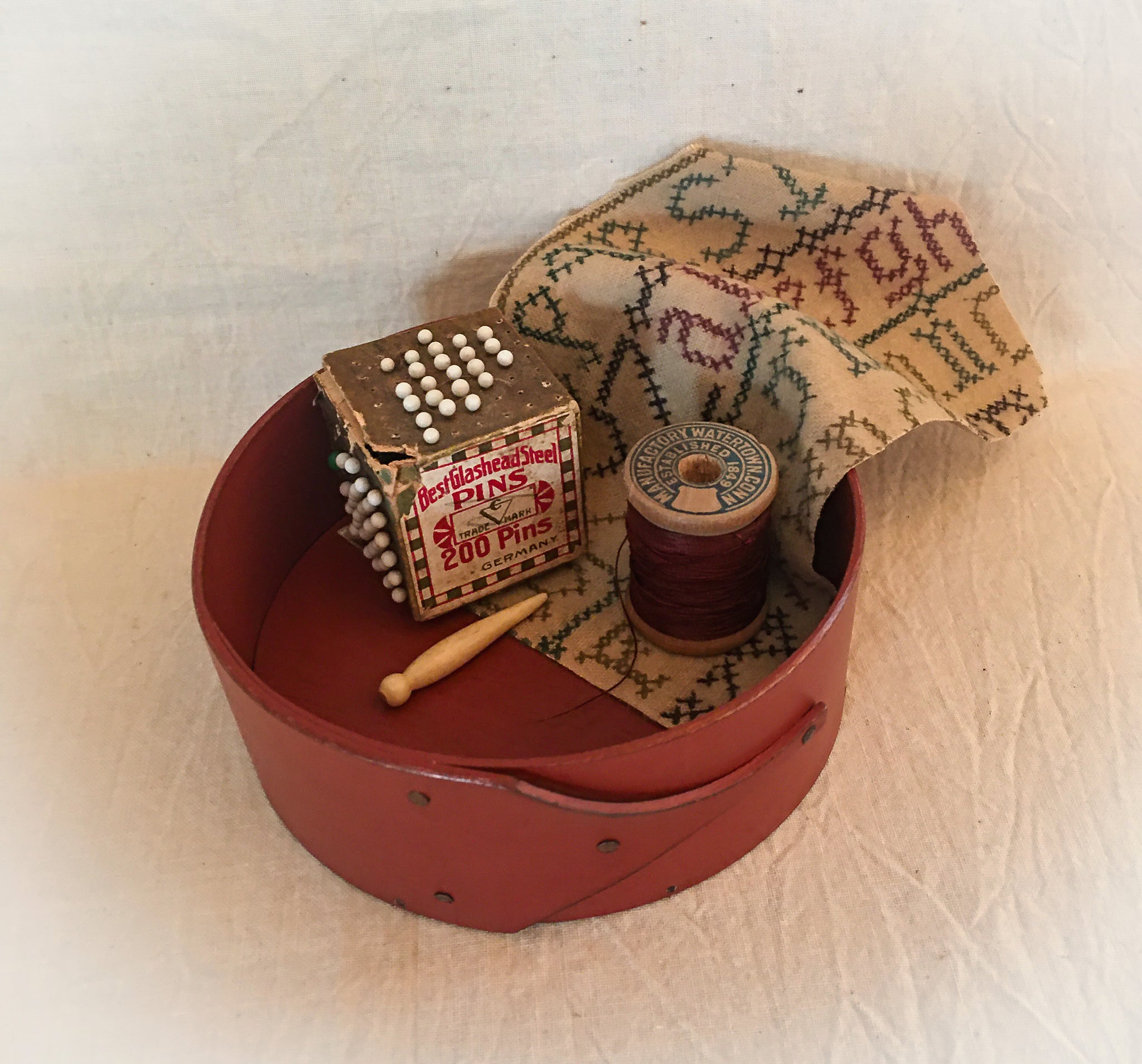 Shaker pin cushion base in red milk paint - handcrafted for mounting finished needlework by LeHay’s Shaker Boxes