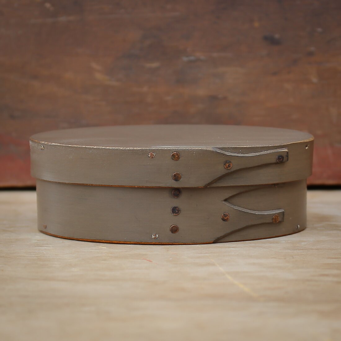 Handcrafted wooden oval shaker box in gray, perfect for sewing and needlework, made in Maine.