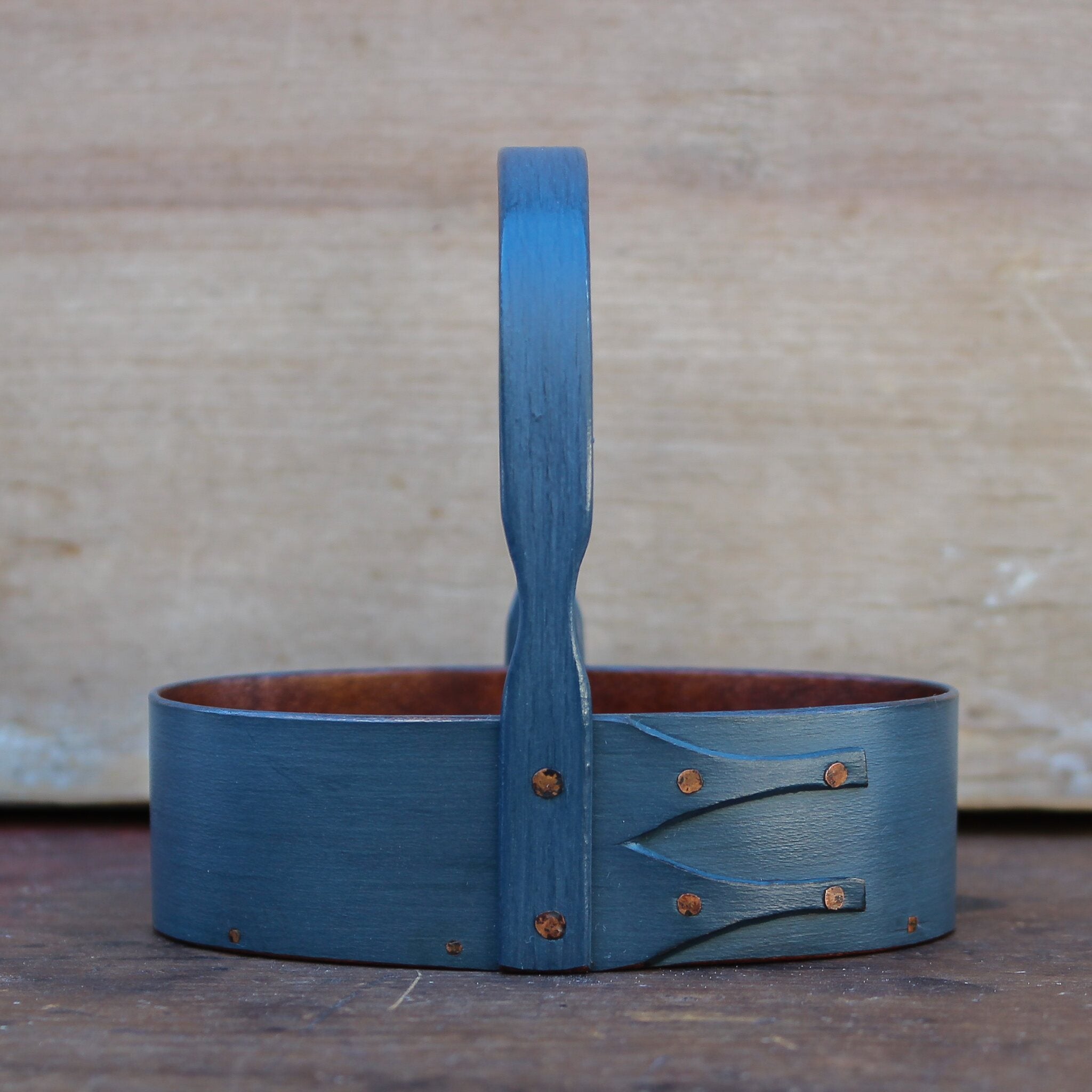 Handcrafted wooden shaker carrier basket with fixed handle, made in Maine, perfect as a holiday ornament.