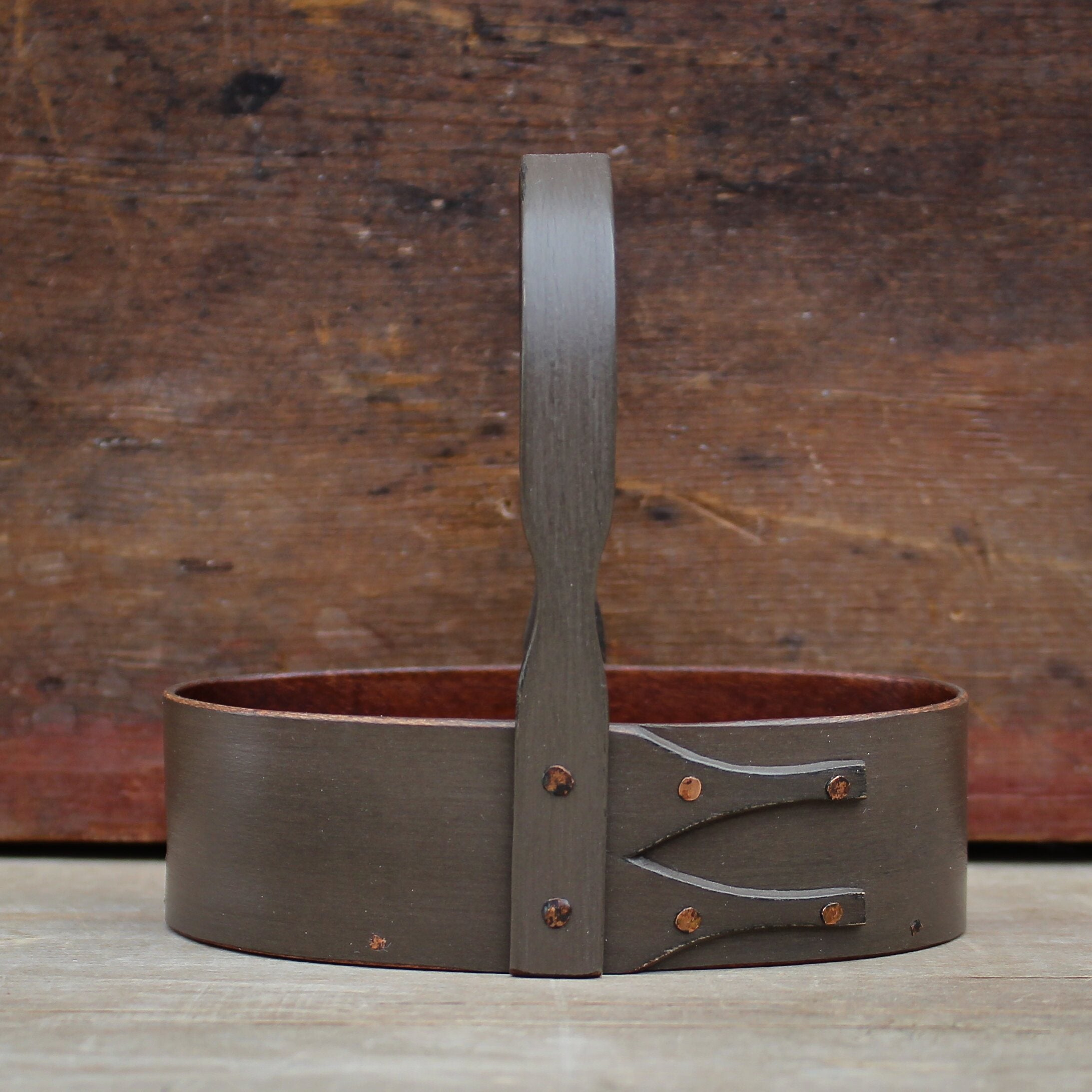 Handcrafted wooden shaker carrier basket with fixed handle, made in Maine, perfect as a holiday ornament.