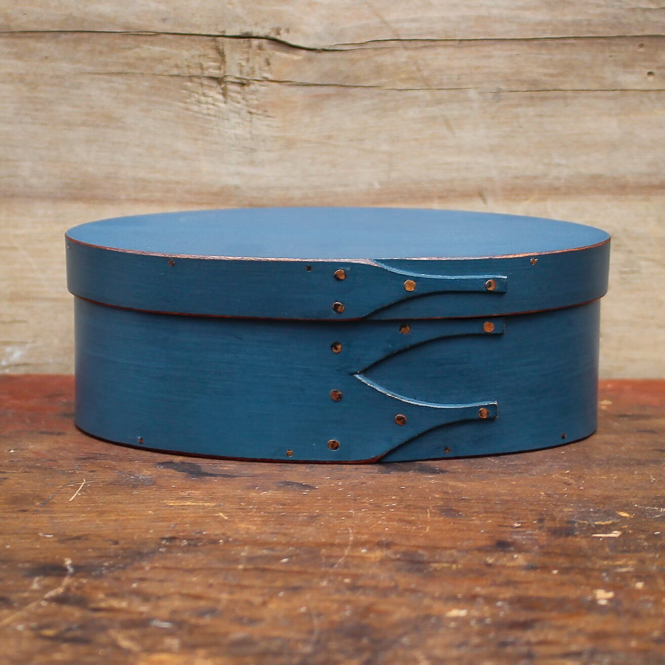 Handcrafted wooden oval shaker box in blue, perfect for sewing and needlework, made in Maine.