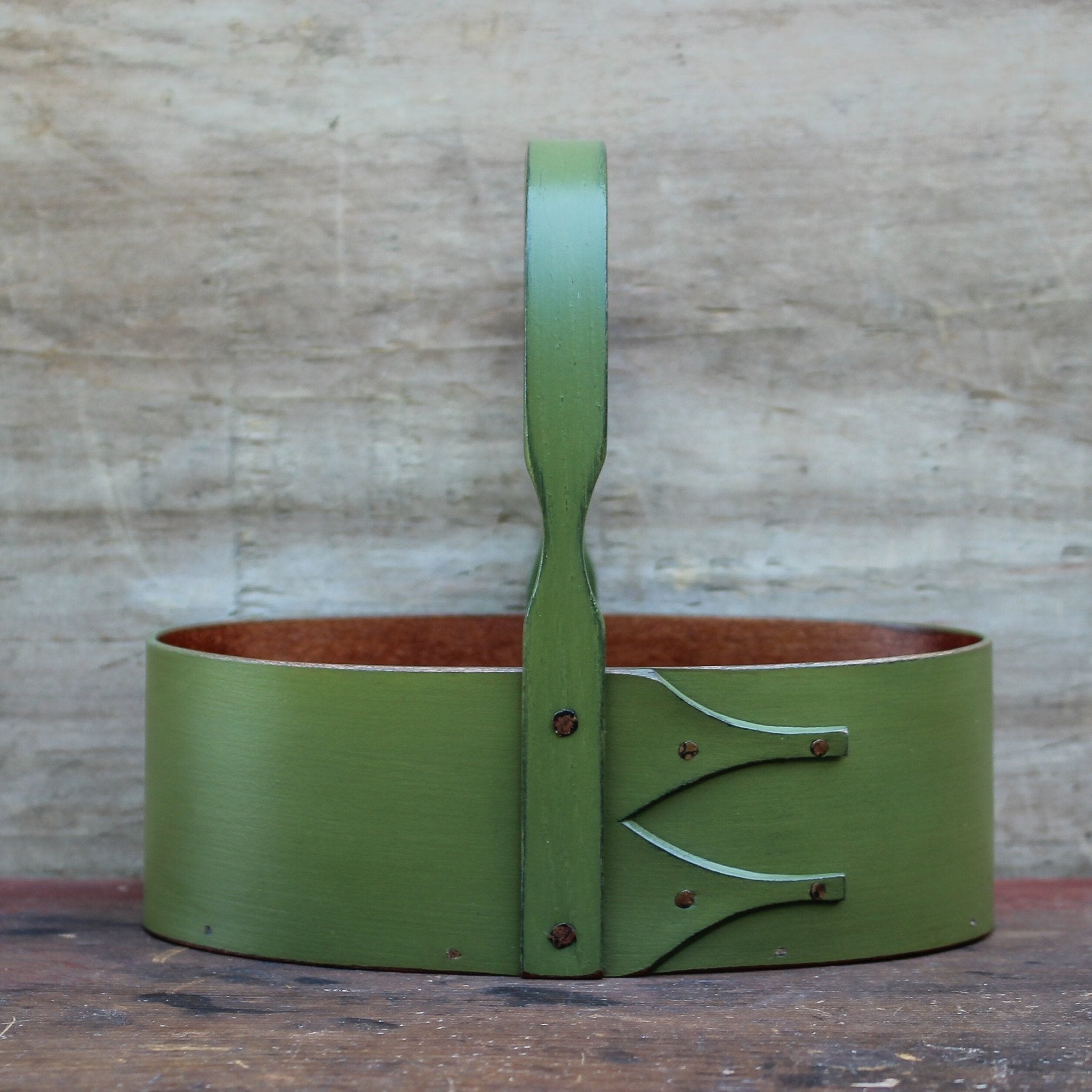 Handcrafted wooden Shaker carrier in green, perfect for sewing organization and desktop organization in Maine.