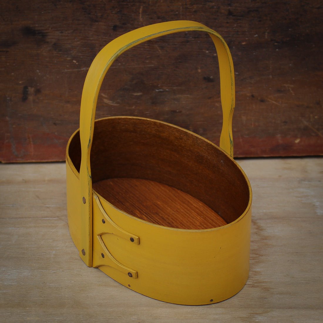 Handcrafted wooden shaker carrier in yellow, perfect as a sewing organizer and for desktop organization.