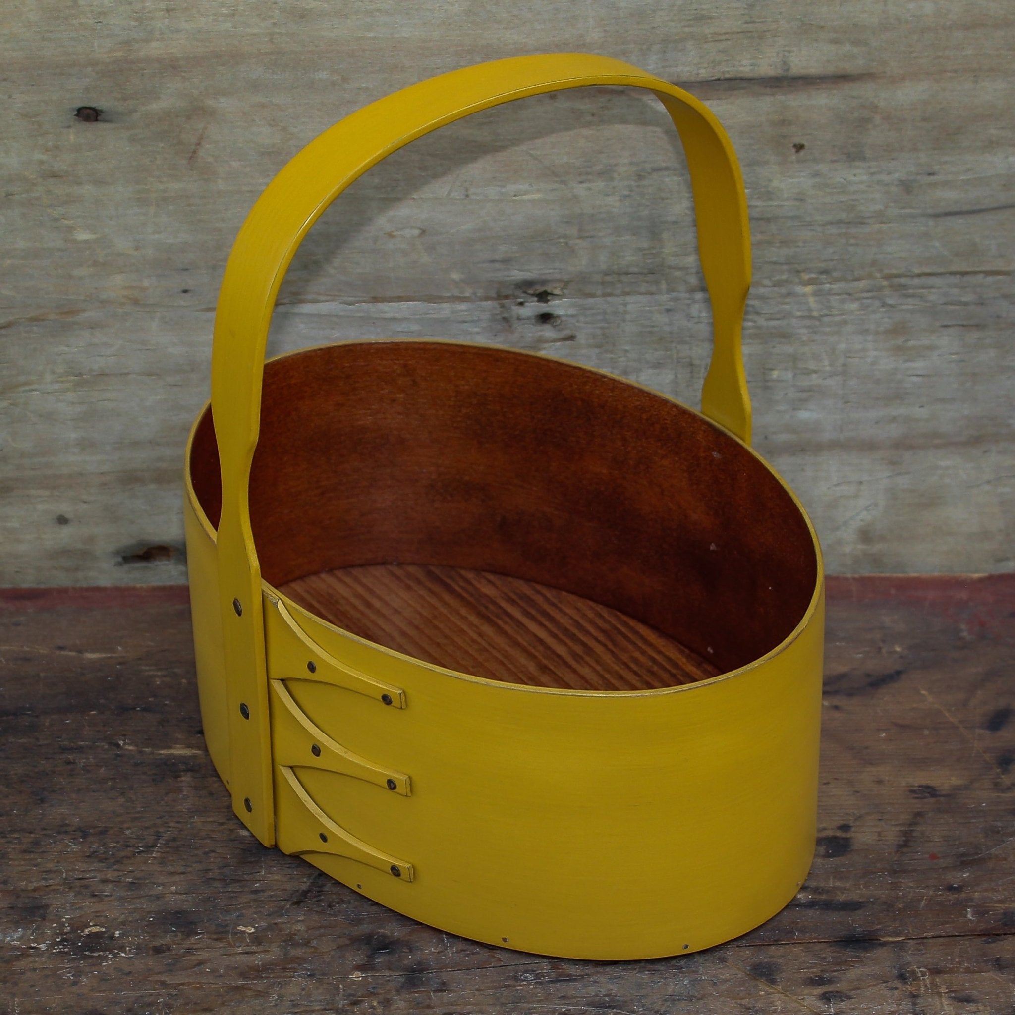Handcrafted wooden Shaker carrier basket in yellow, perfect for sewing and craftroom organization, made in Maine.