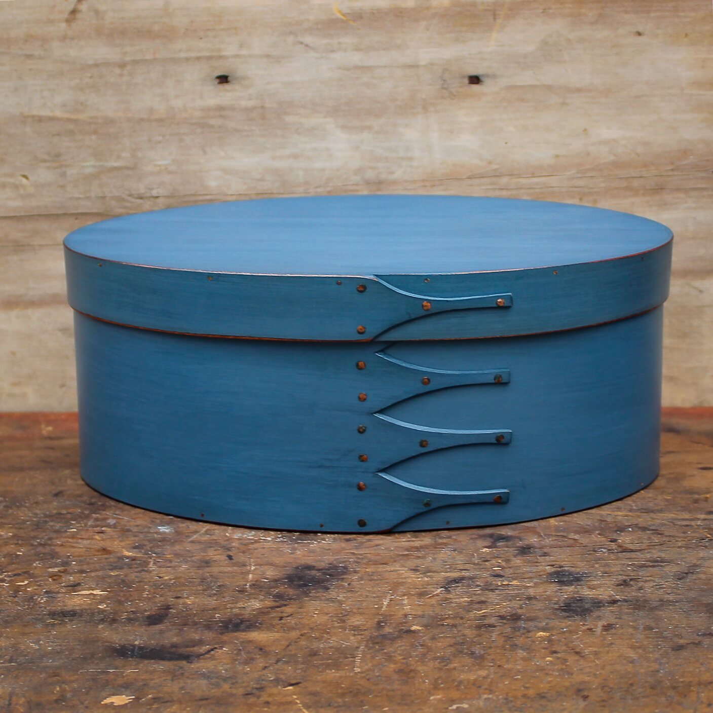 Handcrafted wooden oval shaker box in blue, perfect for sewing and needlework, made in Maine.
