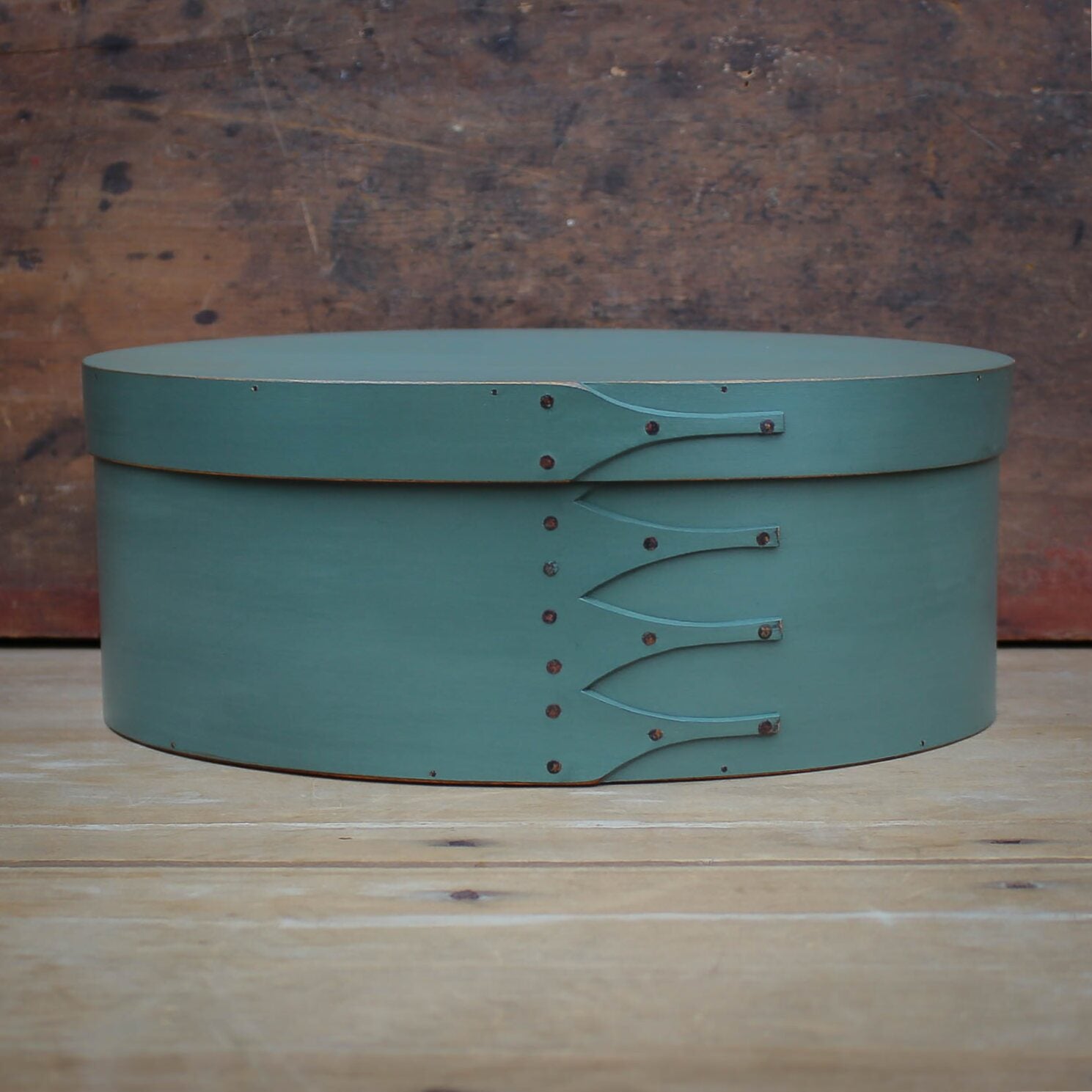 Handcrafted wooden oval shaker box in teal, ideal for sewing and needlework, made in Maine.