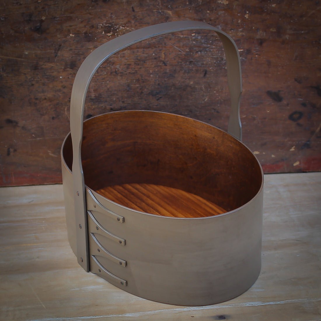 Handcrafted wooden basket shaker carrier from Maine, ideal for sewing organization and craftroom decor.