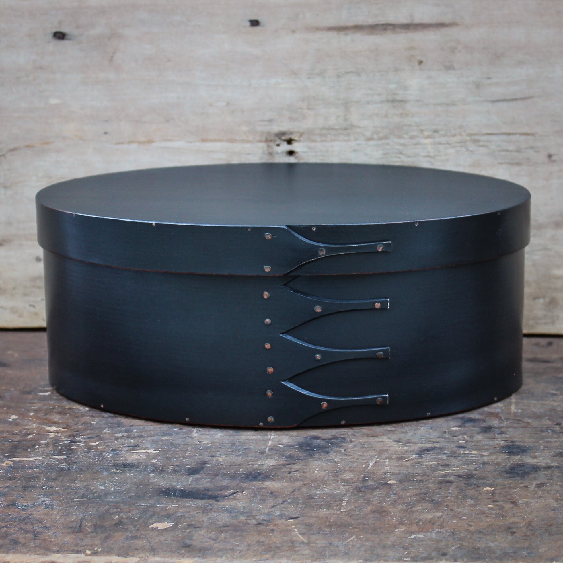 Handcrafted wooden oval shaker box from Maine, perfect for sewing and needlework storage.