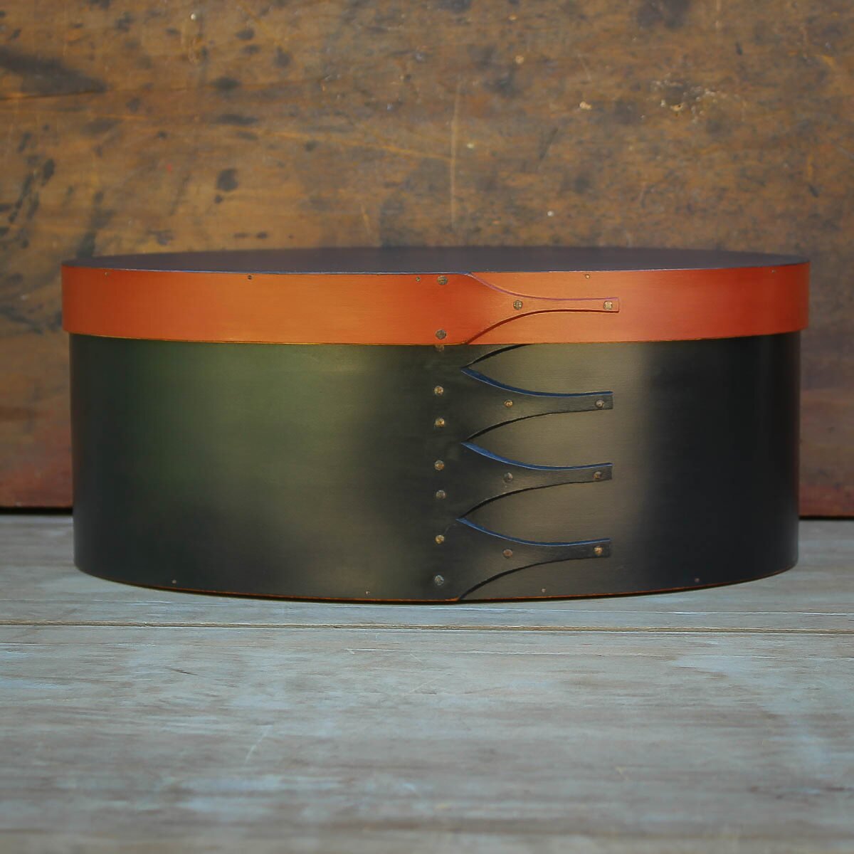 Handcrafted wooden oval Shaker box from Maine, perfect for sewing and needlework storage.