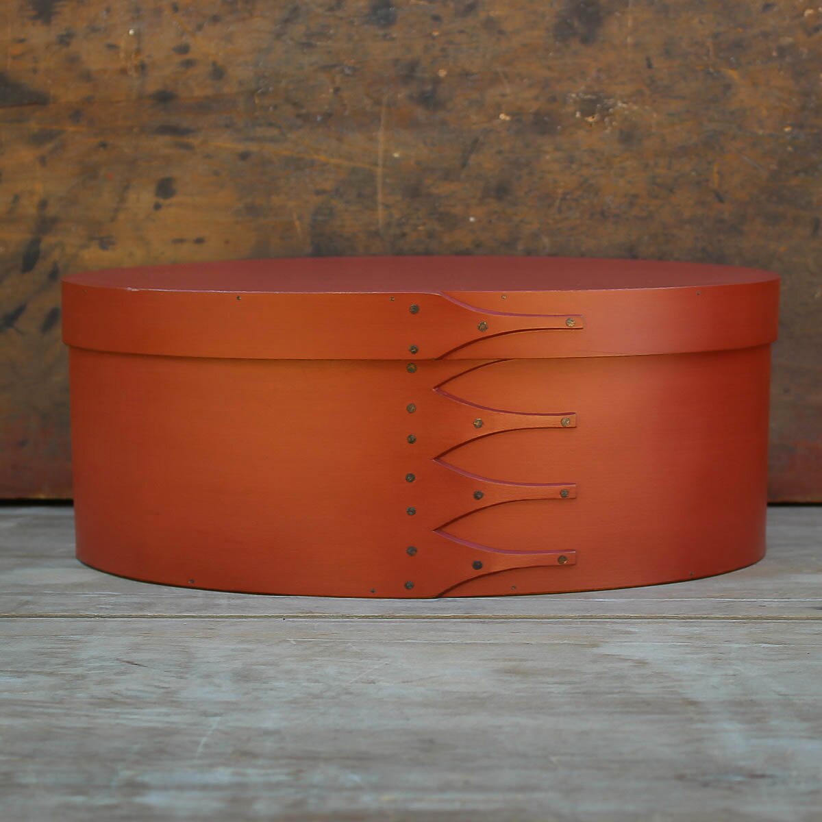 Handcrafted wooden oval sewing box, a shaker box made in Maine, perfect for needlework storage.