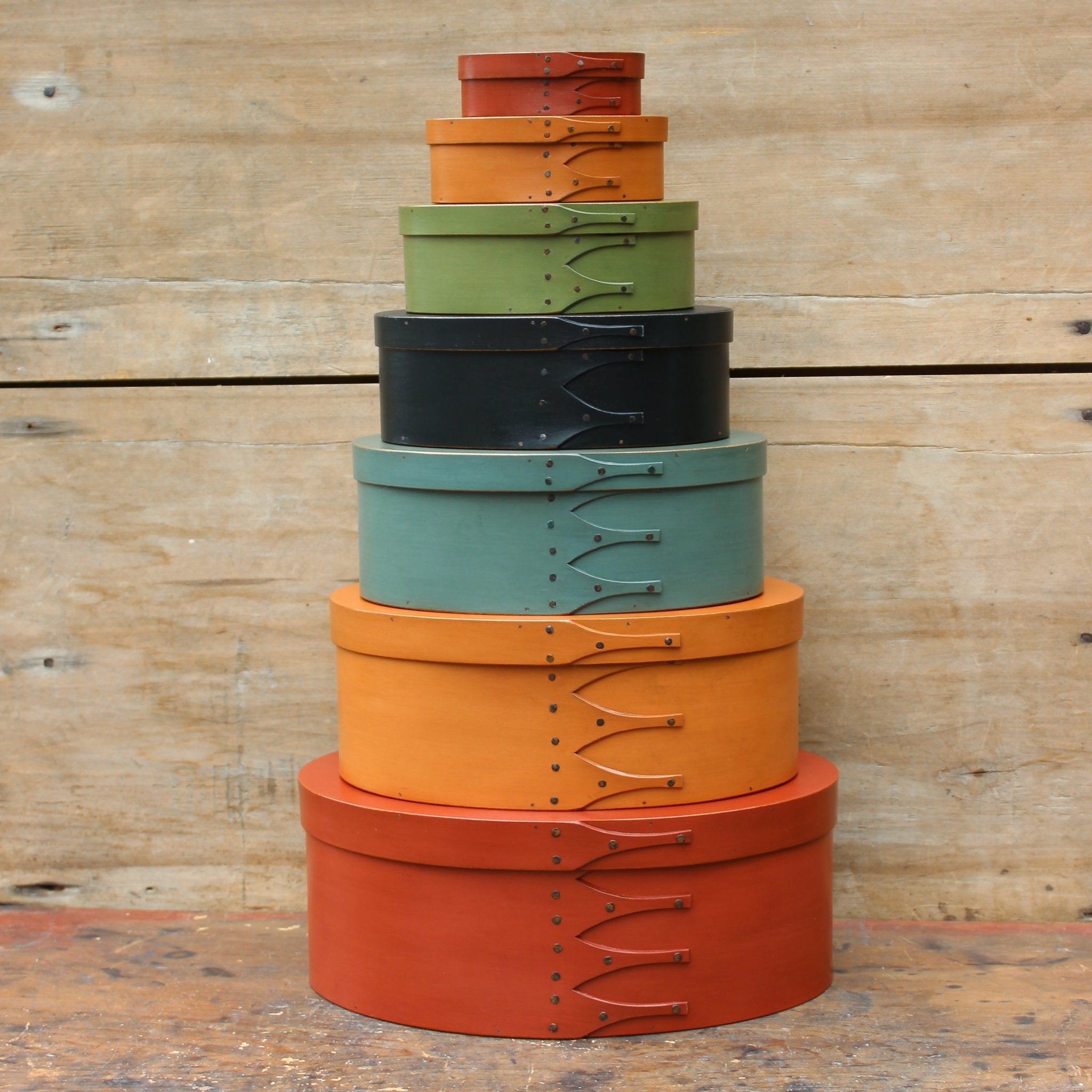 Colorful handcrafted wooden shaker boxes, perfect for sewing and needlework, made in Maine.