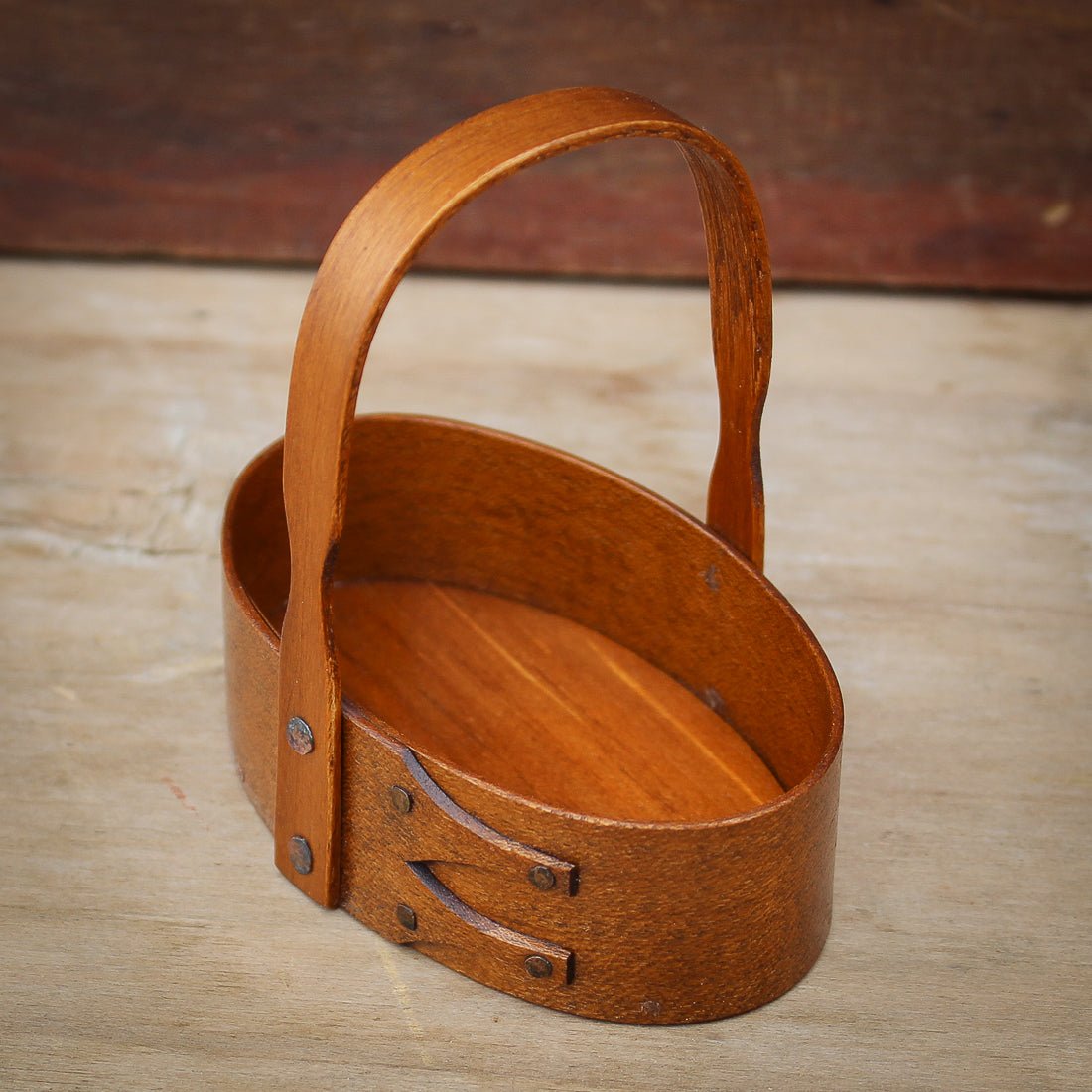 Shaker Carrier, Size #0, LeHays Shaker Boxes, Handcrafted in Maine.  Antiqued Natural Finish, Side View