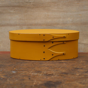 Shaker Oval Box, Size #2, LeHays Shaker Boxes, Handcrafted in Maine.  Yellow Milk Paint Finish, Front View