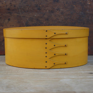 Shaker Oval Box, Size #6, LeHays Shaker Boxes, Handcrafted in Maine.  Yellow Milk Paint Finish, Front View